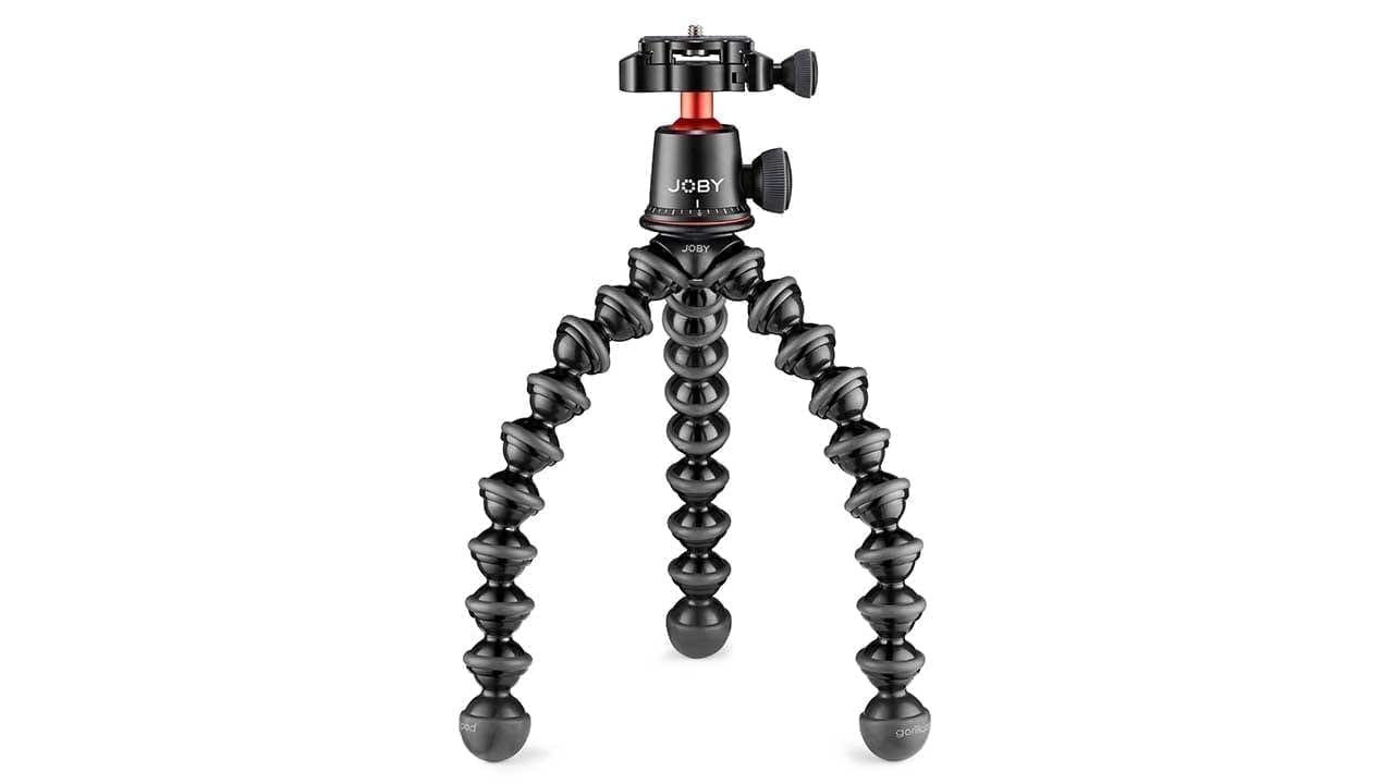 Camera supports have evolved and at the forefront of that revolution is the JOBY GorillaPod for DSLR and Mirrorless. Its been over ten years since the first of these flexible legged supports arrived the design and materials have adapted to suit the needs of today's photographers. The pro-grade metal GorillaPod 3K series has been a popular addition to the range with more advanced photographers finding the flexibility of being able to wrap the legs around almost anything to create support handy. Taking the 3K series to another level JOBY has now added an all-new BallHead 3K Pro which will feature Arca Swiss compatibility. This Professional version of the GorillaPod will appeal to all users looking for a versatile way to hold and support their cameras. This new GorillaPod will have a maximum payload of 3kf (6.6Ibs) more than enough for most CSC and a vast majority of enthusiast DSLRs. Some of the main highlights of the GorillaPod 3K PRO series features: The GorillaPod 3K PRO Kit combines the BallHead 3K PRO with the versatile GorillaPod 3K PRO Stand for groundbreaking content creation. New aluminum BallHead 3K Pro with an Arca-Swiss compatible Quick Release plate that matches the smaller footprint of new mirrorless camera systems. This ball head allows 90-degree tilt and 360-degree pan movements. A secondary knob has been added to lock pan separately and a numbered scale on the base lets users accurately repeat 360-degree pans. The versatile ¼”-20 mount allows users to attach and stabilize cameras, strobes, flash, mics and any other hardware up to 3kg. The defining feature of all GorillaPods is the flexible legs and here with the GorillaPod 3K PRO Stand, it has twenty four high precision ball and socket joints. This ensures that the camera will secure a camera to any surface, with or without the ball head, making it one of the most lightweight camera supports for versatile shooting angles. The GorillaPod 3K PRO Rig is one option in the range and is made of the GorillaPod 3K PRO Kit with the Hub Plate and the GorillaPod Arms. The modular makeup of the GorillaPod allows the lights, mics, monitors and other accessories up to 3kg (6.6lbs) to be attached, transforming it into the perfect choice for vloggers. The GorillaPod 3K PRO series will be available towards the end of Q2 as soon as we hear the exact date and price we'll let you know.
